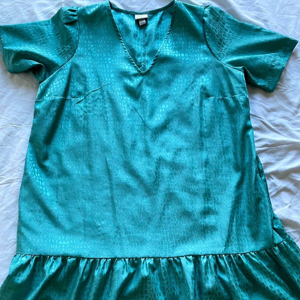 Leopard print, light teal knee length dress, satin materi